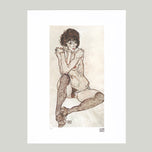 LYING NAKED GIRL IN A STRIPED SLIPS